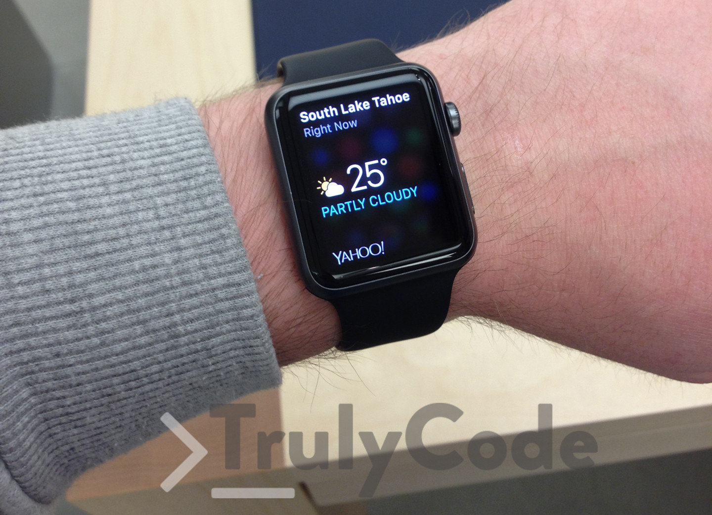 Black Apple watch on wrist